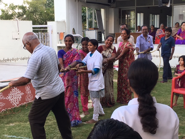 Residents and staff playing games at SMILES . 