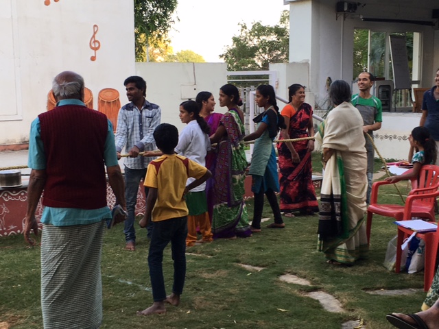 Residents and staff playing games at SMILES . 