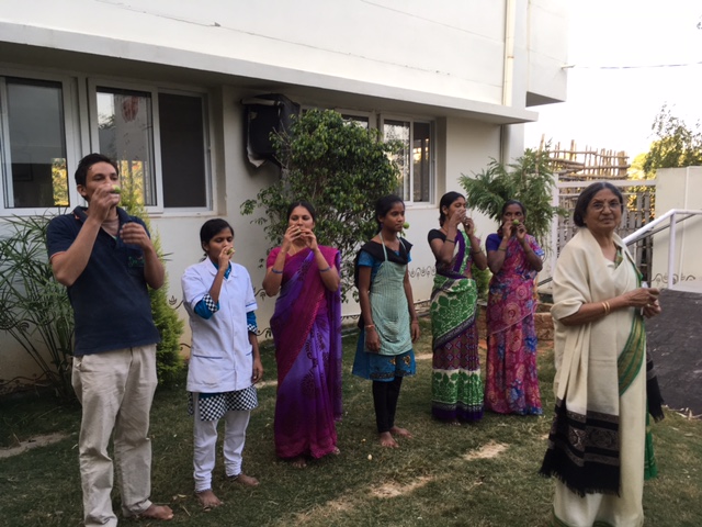 Residents and staff playing games at SMILES . 