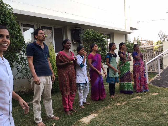 Residents and staff playing games at SMILES . 