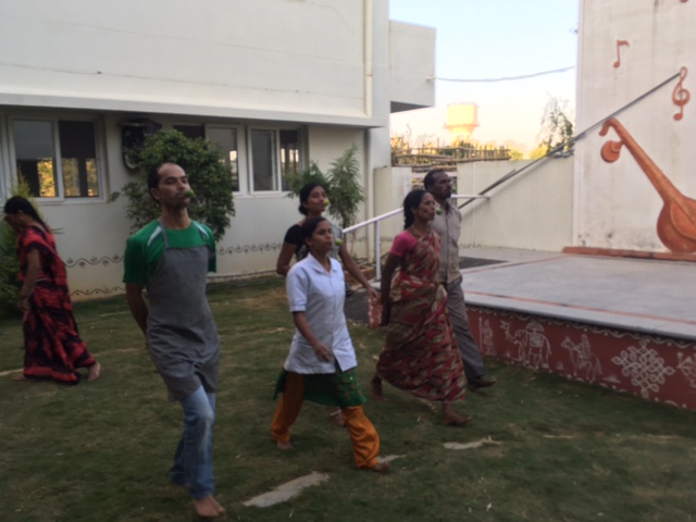 Residents and staff playing games at SMILES . 