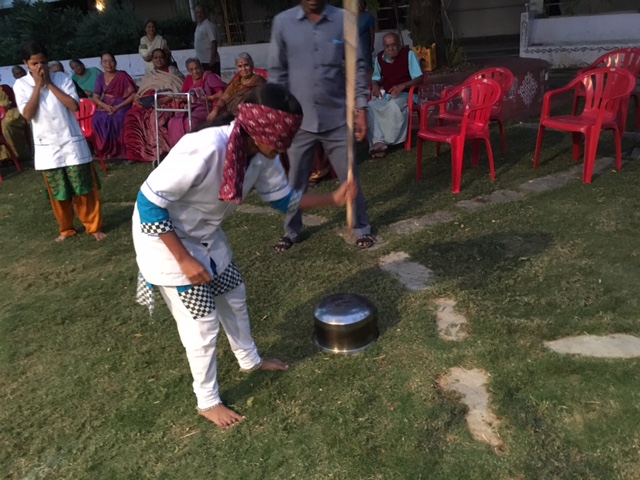 Residents and staff playing games at SMILES . 