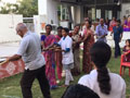 Residents and staff playing games at SMILES . 