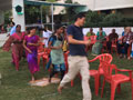 Residents and staff playing games at SMILES . 