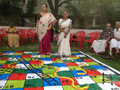 SNAKES AND LADDERS GAME PLAYED BY RESIDENTS AND EMPLOYEES at SMILES 