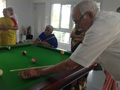 RESIDENTS ENJOYING SNOOKER AT SMILES