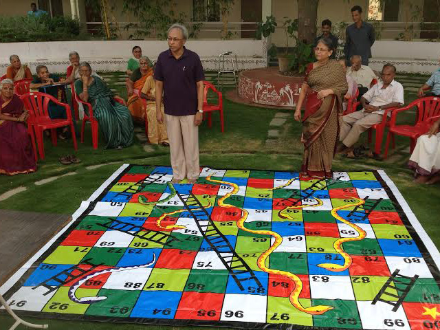SNAKES AND LADDERS GAME PLAYED BY RESIDENTS AND EMPLOYEES at SMILES 
