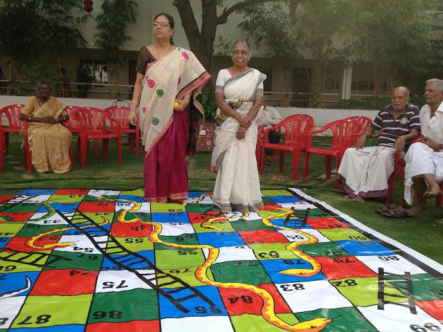 SNAKES AND LADDERS GAME PLAYED BY RESIDENTS AND EMPLOYEES at SMILES 